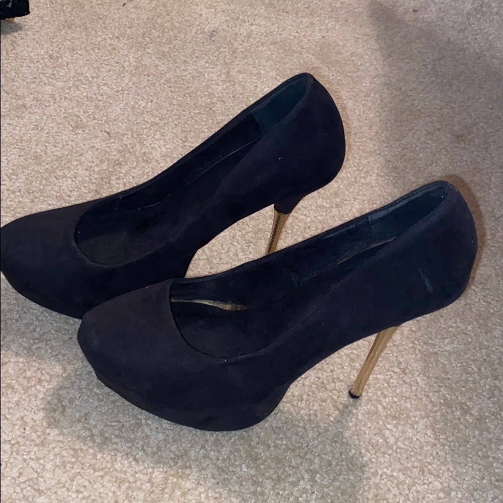 Black and gold high heels